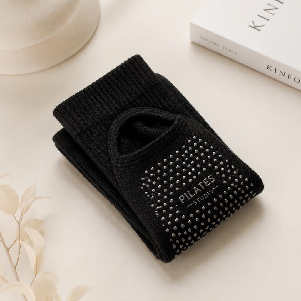 Black Casa Pilates grip socks with non-slip sole
